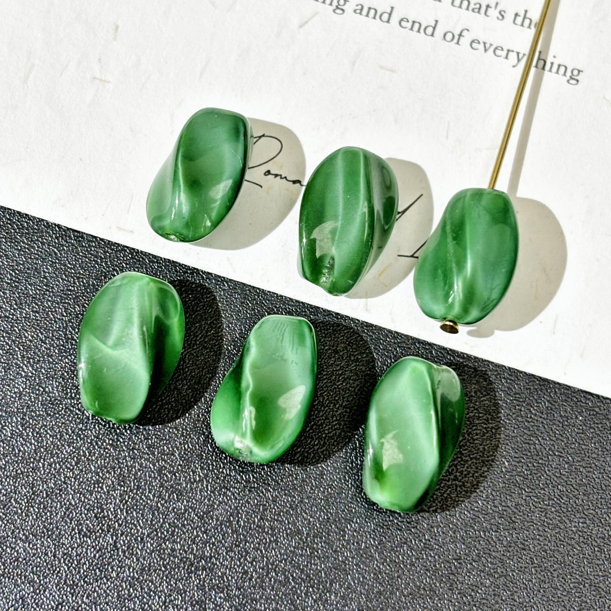 7*14mm Czech Glass Emeral Green Twisted Barrel