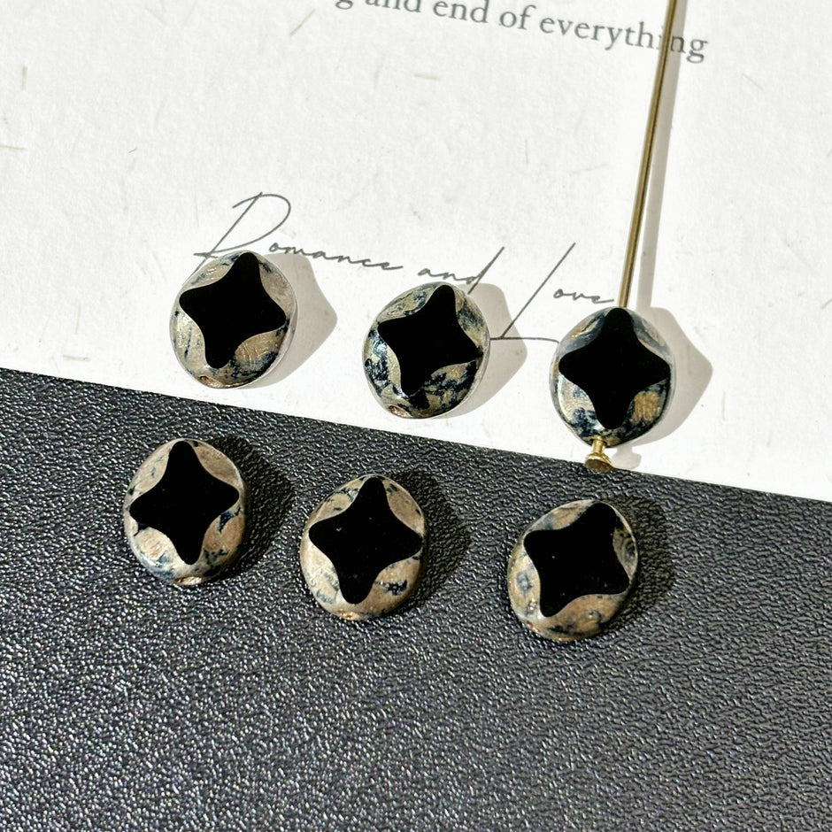 8x9mm Czech Glass Faceted Cross Pinch Beads - Vintage Mottled Black