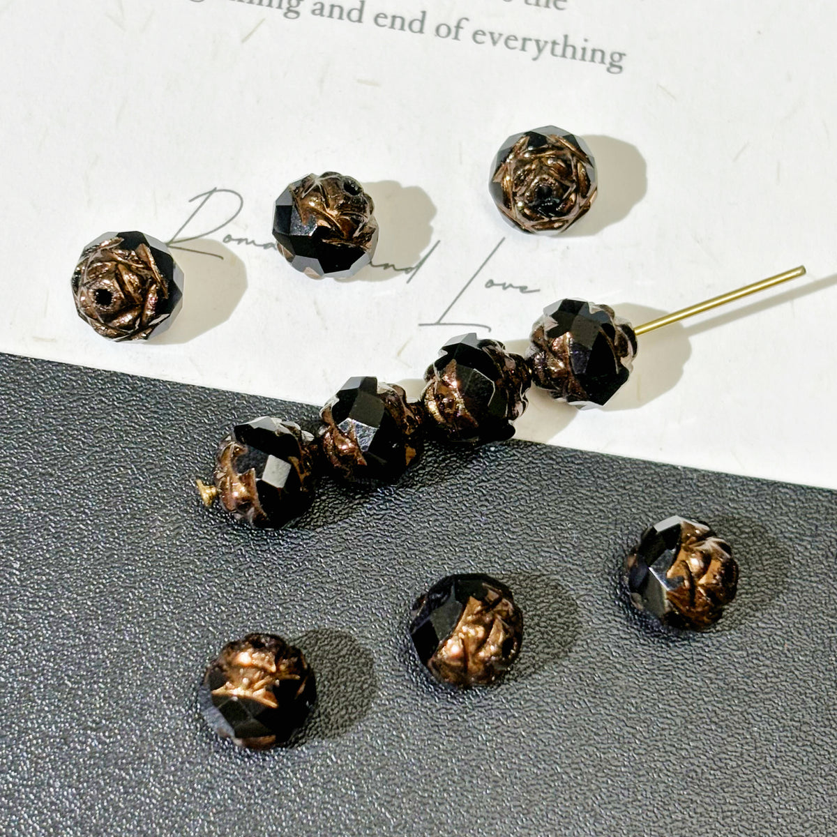 5x7mm Czech Glass Double-Sided Rose Bud Beads - Opaque Black with Antique Bronze Gold
