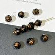 5x7mm Czech Glass Double-Sided Rose Bud Beads - Opaque Black with Antique Bronze Gold