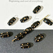 4x9mm Czech Glass Pressed Star Barrel Beads - Black & Metallic Gold