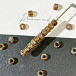 4mm Miyuki Seed Beads - Translucent Amber Picasso Finish (8/0)  Description