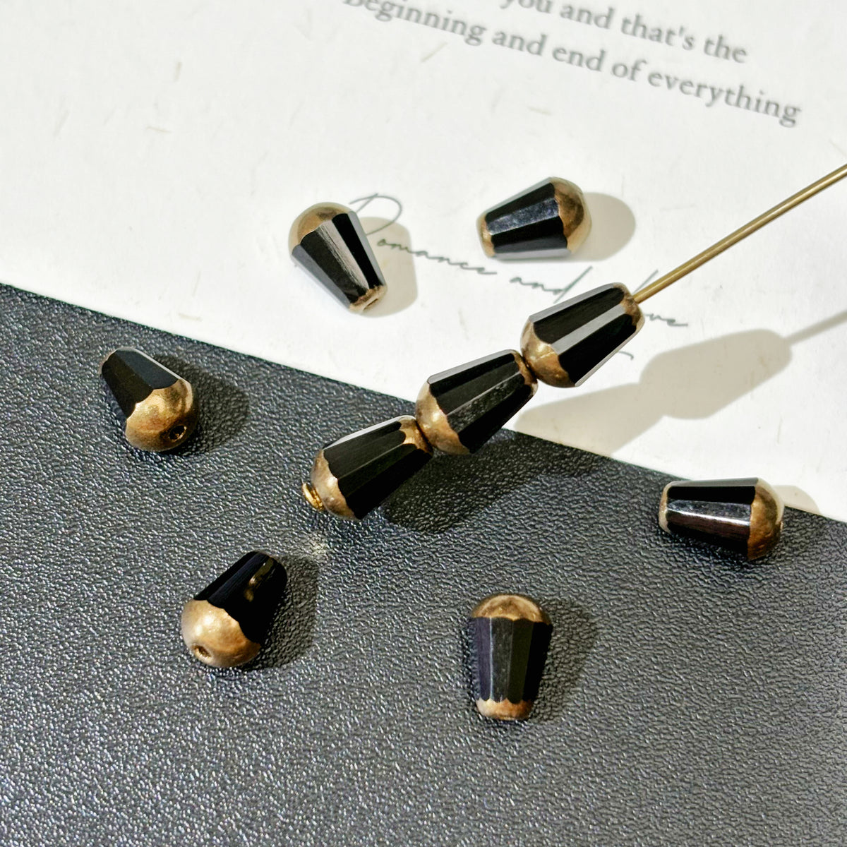 6x8mm Czech Glass Faceted Top-Drilled Tear Drops - Solid Black with Antique Bronze Gold